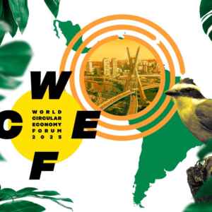 Diretor da Vale cobra políticas públicas para ampliar economia circular Logotipo do Fórum Mundial de Economia Circular (WCEF 2025), com a letra W em destaque, sobreposto a uma imagem de uma cidade e uma ponte, com folhas verdes e um pássaro amarelo ao redor.