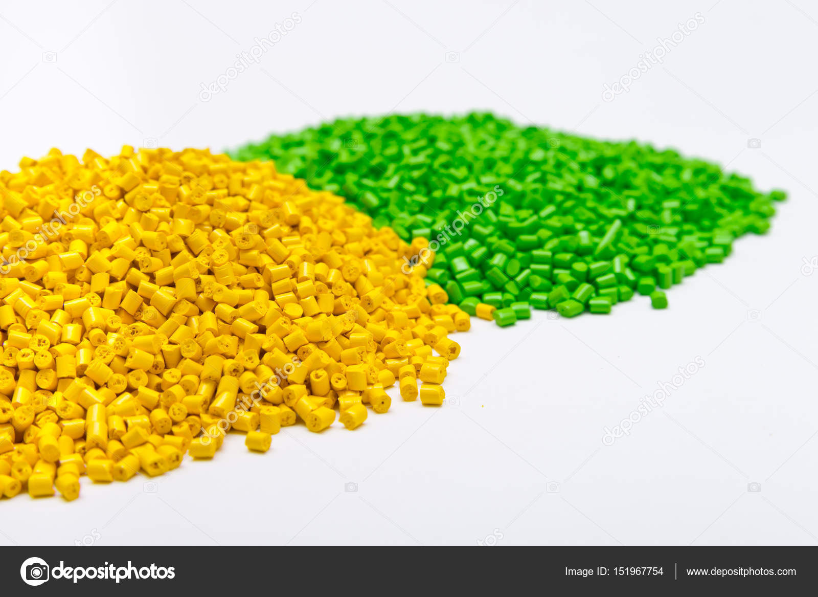 depositphotos 151967754 stock photo green and yellow plastic pellets
