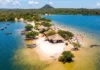 Descubra por que Alter do Chão é eleita o Caribe da Amazônia com suas praias de areia branca no Rio Tapajós e floresta nativa Alter do Chão, mostrando a areia branca e o Rio Tapajós