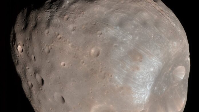 A lua de Marte que está condenada a cair no planeta pode ter nascido de uma colisão gigante; uma cratera de 9 km guarda a resposta A lua de Marte que está condenada a cair no planeta pode ter nascido de uma colisão gigante; uma cratera de 9 km guarda a resposta