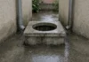 Por 14 anos, dois vizinhos usaram o mesmo poço de drenagem sem contrato: uma chuva forte provocou alagamento e uma disputa sobre quem deveria pagar
